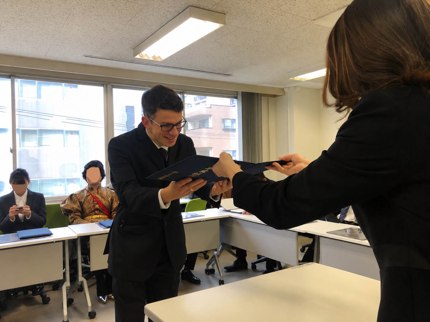 Diplômé de Aso College Group Japanese Language