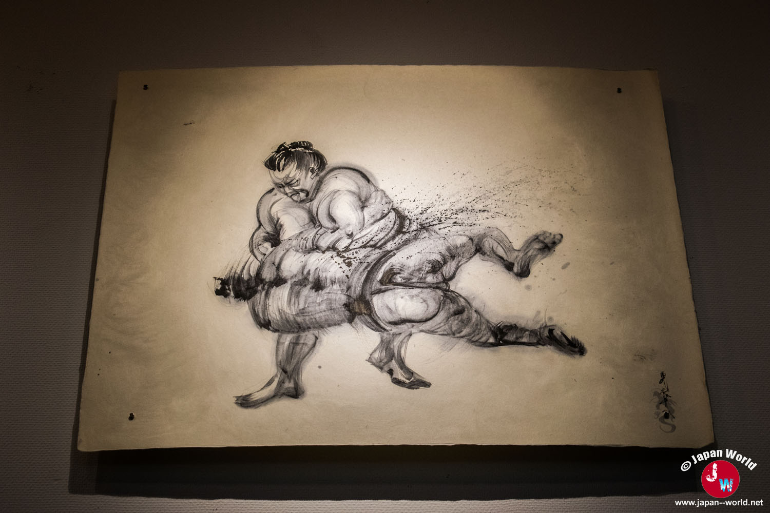 Combat de sumo représenté à l'encre dans l'exposition de Yuki Nishimoto